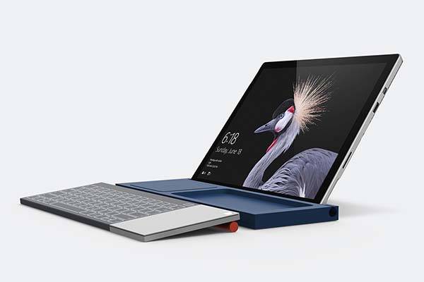 The Microsoft All-In-One Keyboard with Wireless Charging Pad and Tablet Stand