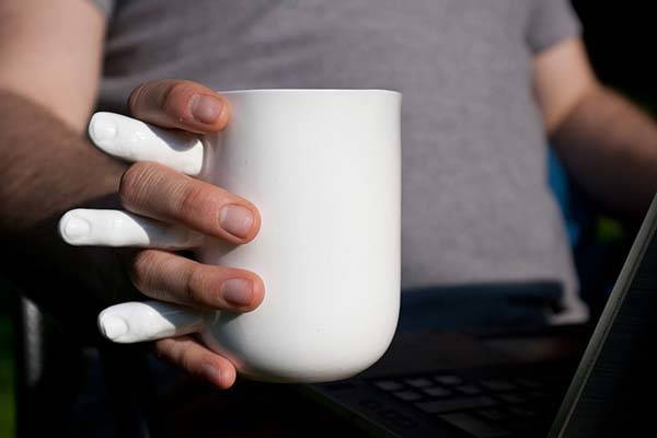 The Handmade Coffee Mug Wants to Hold Your Hand with Fingers