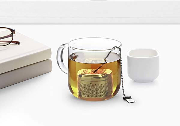 Umbra Cutea Metal Tea Infuser with Ceramic Saucer